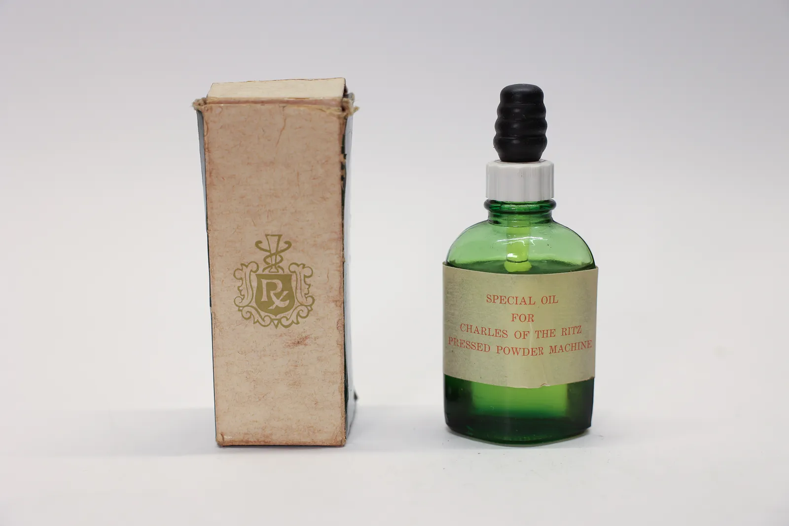 Vintage Charles of the Ritz Special Oil Bottle