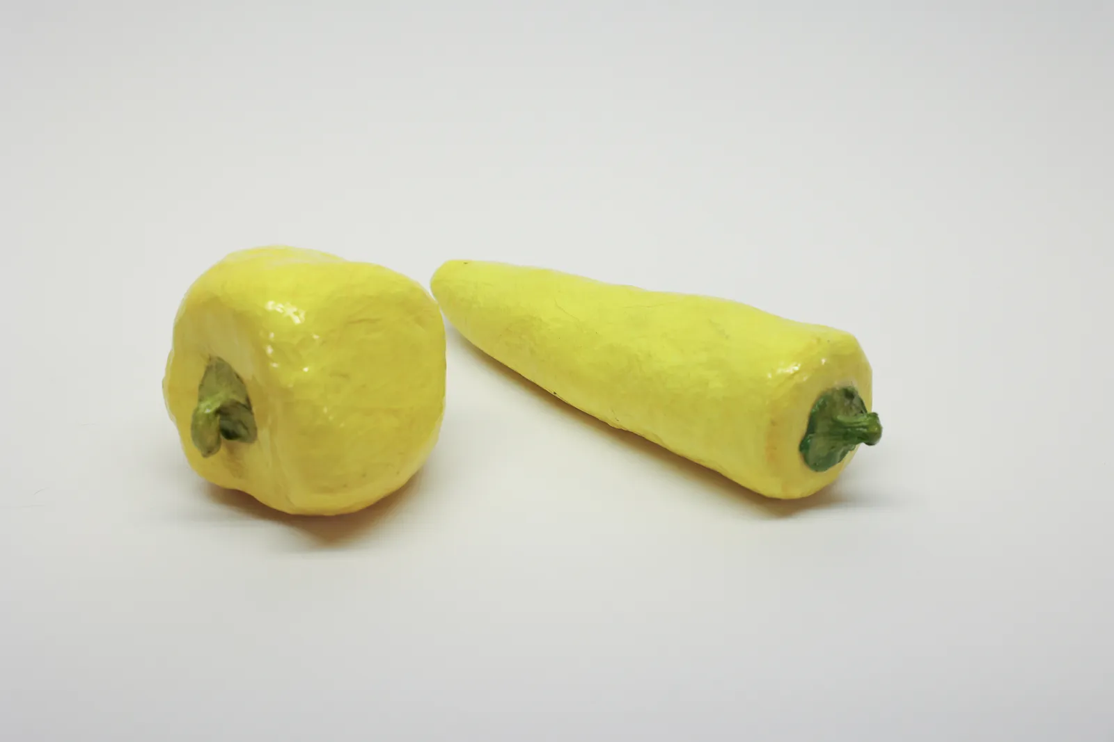 Pair of Lacquered Papier-Mâché Yellow Peppers