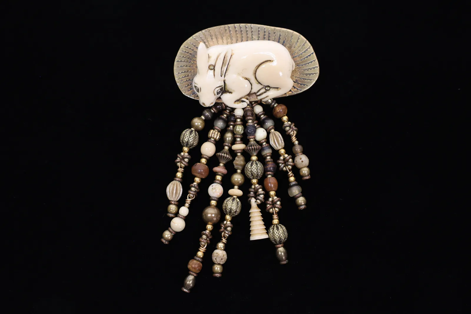 Signed Navarro Carved Bone Rabbit Fringe Brooch