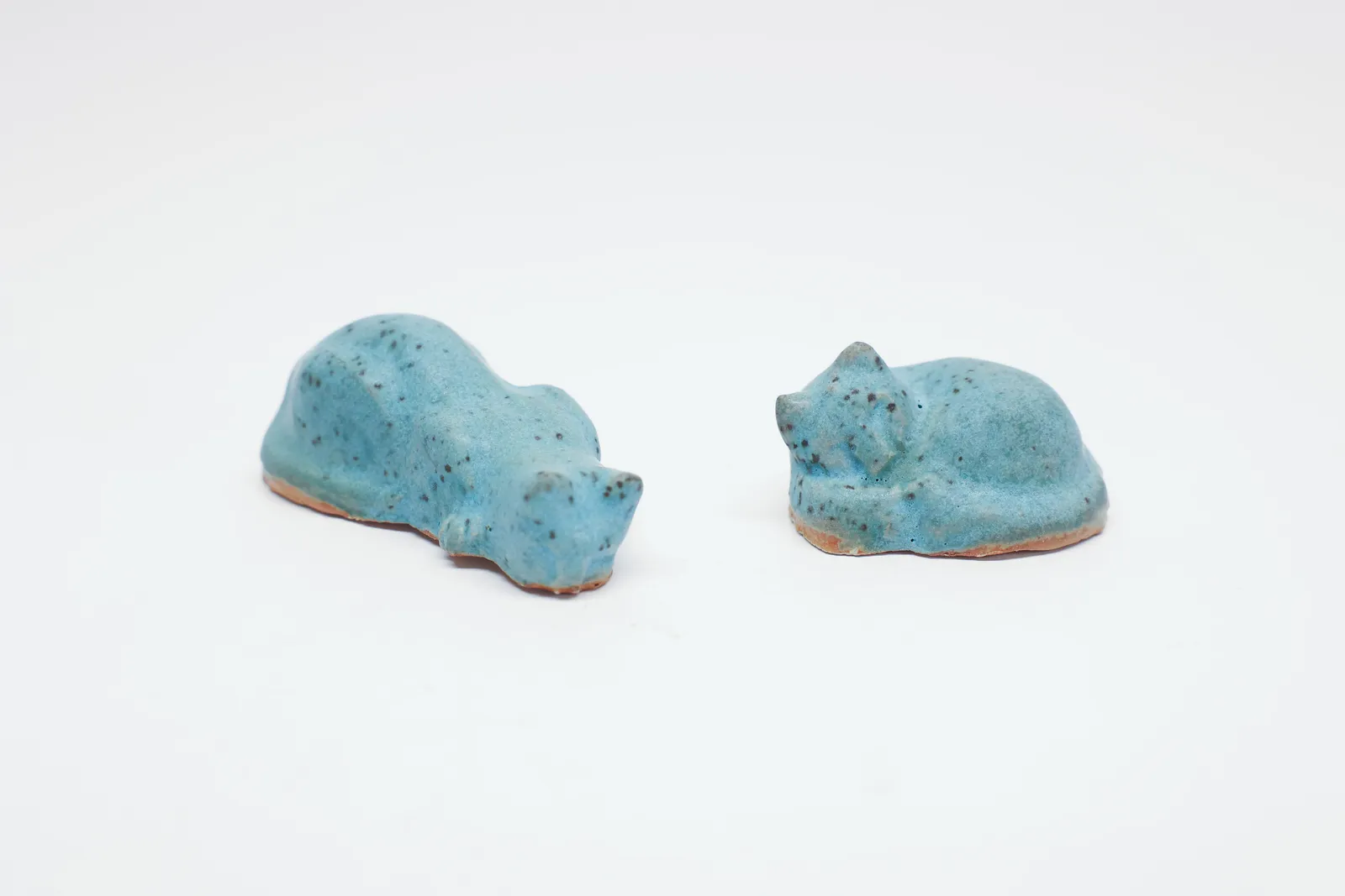 Pair of Turquoise Blue Glazed Pottery Cats